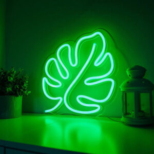 Photo représentant une lampe néon led représentant une feuille verte