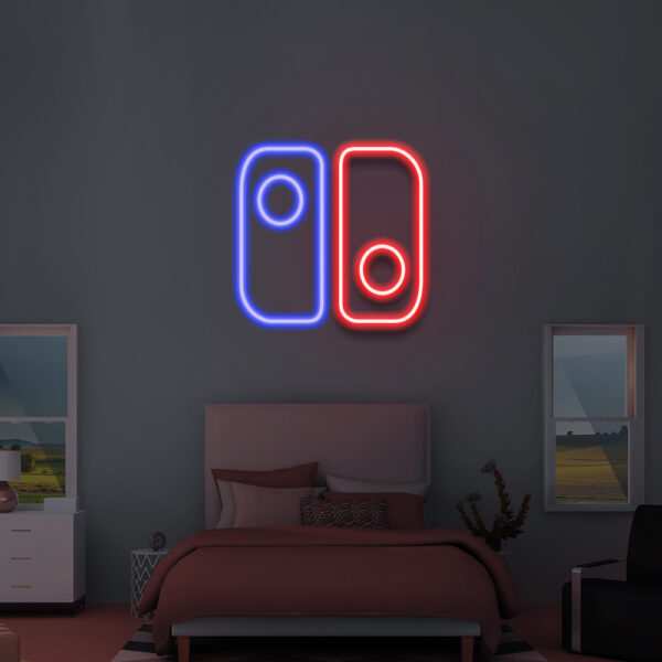 Luminaire néon représentant une manette de Nintendo Switch bleue et une rouge